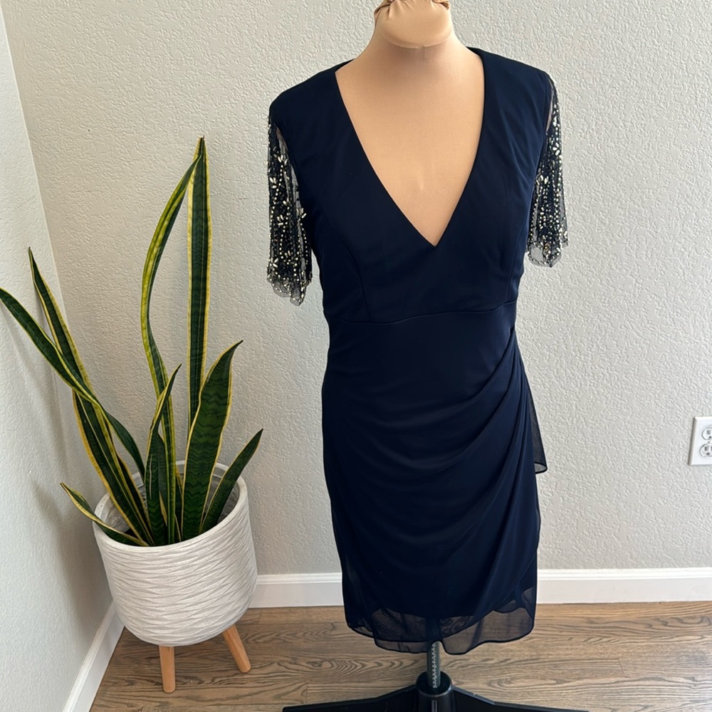 Formal dress. X by xscape. Size 14 navy blue with gold beaded sleeves.